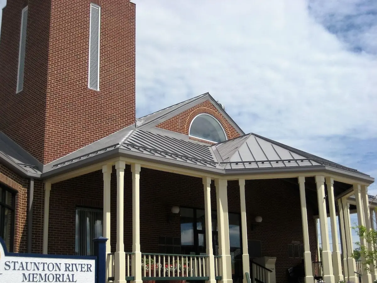 Skilled roofing craftsmen working on a residential roof in Spokane Valley